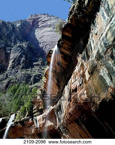 Low angle view of a waterfall, Emerald Pools, Zion National Park, Utah, USA View Large Photo Image Stock Photograph - Low angle view of a waterfall, Emerald Pools, Zion National Park, Utah, USA. Fotosearch