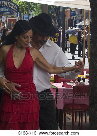 Stock Image - Mature couple dancing Tango, Buenos Aires, Argentina. Fotosearch