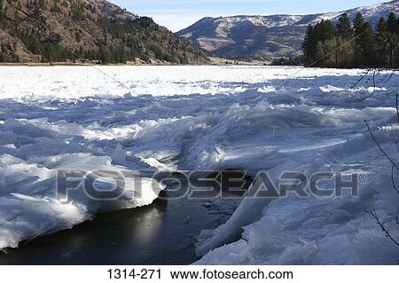 Panoramic view of a frozen river, Flathead River, Montana, USA View Large Photo Image Stock Image - Panoramic view of a frozen river, Flathead River, Montana, USA. Fotosearch