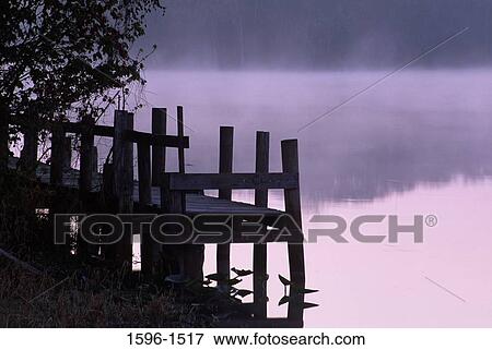Stock Photo - Pier on the bank of a river, St. John's River, Ed Stone Park, Florida, USA. Fotosearch