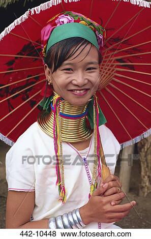 Portrait of a Karen tribal woman holding a parasol, Chiang Rai, Chiang Rai Province, Thailand View Large Photo Image Stock Photo - Portrait of a Karen tribal woman holding a parasol, Chiang Rai, Chiang Rai Province, Thailand. Fotosearch