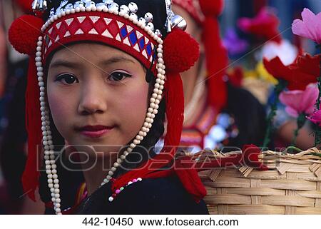 Portrait of an Akha tribal girl wearing a traditional headpiece, Chiang Rai, Chiang Rai Province, Thailand View Large Photo Image Stock Image - Portrait of an Akha tribal girl wearing a traditional headpiece, Chiang Rai, Chiang Rai Province, Thailand. Fotosearch