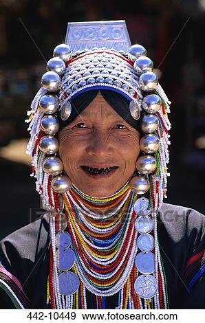 Portrait of an Akha tribal woman wearing traditional silver jewelry, Chiang Rai, Chiang Rai Province, Thailand View Large Photo Image Stock Photo - Portrait of an Akha tribal woman wearing traditional silver jewelry, Chiang Rai, Chiang Rai Province, Thailand. Fotosearch