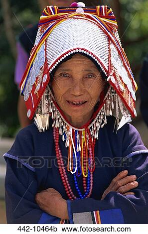 Portrait of an Akha tribal woman with her arms crossed, Chiang Rai, Chiang Rai Province, Thailand View Large Photo Image Stock Image - Portrait of an Akha tribal woman with her arms crossed, Chiang Rai, Chiang Rai Province, Thailand. Fotosearch