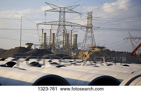 Stock Image - Power line over a construction site, Dubai, United Arab Emirates. Fotosearch