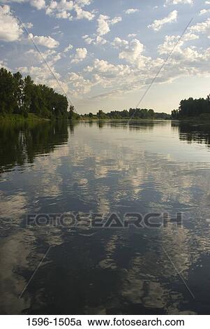 Reflection of clouds in water, Willamette River, Willamette River Greenway, Oregon, USA View Large Photo Image Stock Image - Reflection of clouds in water, Willamette River, Willamette River Greenway, Oregon, USA. Fotosearch