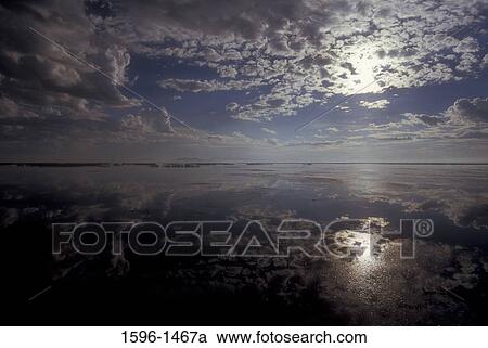 Reflection of clouds in water, Tule Lake National Wildlife Refuge, California, USA View Large Photo Image Stock Image - Reflection of clouds in water, Tule Lake National Wildlife Refuge, California, USA. Fotosearch
