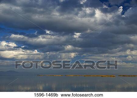 Reflection of clouds in water, Tule Lake National Wildlife Refuge, California, USA View Large Photo Image Stock Image - Reflection of clouds in water, Tule Lake National Wildlife Refuge, California, USA. Fotosearch