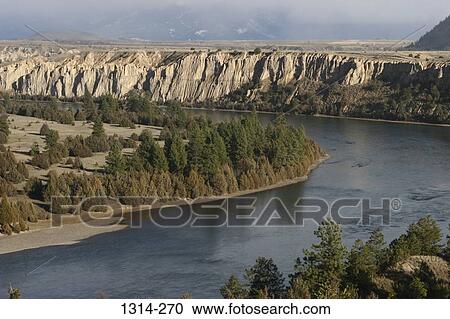 Stock Image - River flowing through mountains, Flathead River, Montana, USA. Fotosearch