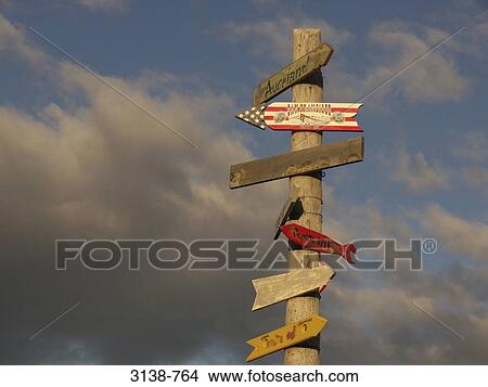 Road signs on a wooden post, Magellan, Patagonia, Chile View Large Photo Image Picture - Road signs on a wooden post, Magellan, Patagonia, Chile. Fotosearch