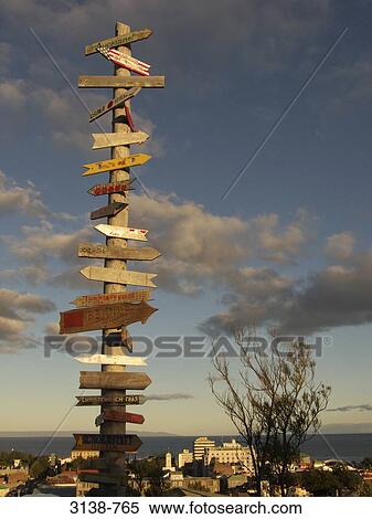 Road signs on a wooden post, Magellan, Patagonia, Chile View Large Photo Image Stock Photography - Road signs on a wooden post, Magellan, Patagonia, Chile. Fotosearch