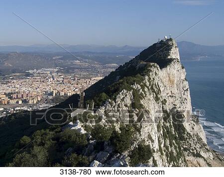 Rock formation with a city in the background, Rock of Gibraltar, Gibraltar, Spain View Large Photo Image Stock Image - Rock formation with a city in the background, Rock of Gibraltar, Gibraltar, Spain. Fotosearch