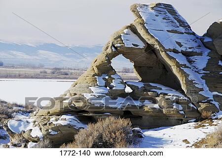 Rocks covered with snow, Pilot Butte, Wyoming, USA View Large Photo Image Stock Image - Rocks covered with snow, Pilot Butte, Wyoming, USA. Fotosearch