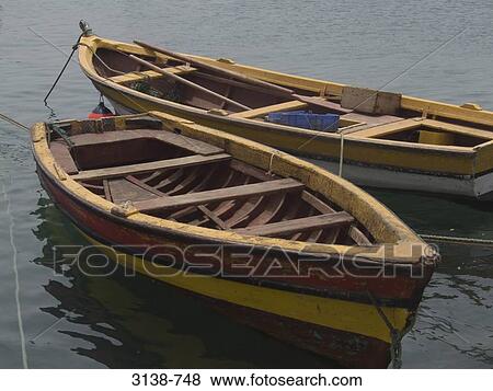 Stock Photo - Rowboats in the sea, Palmeira, Sal, Cape Verde. Fotosearch