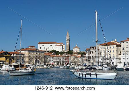 Sailboats at a harbor, Piran, Slovenia View Large Photo Image Stock Image - Sailboats at a harbor, Piran, Slovenia. Fotosearch