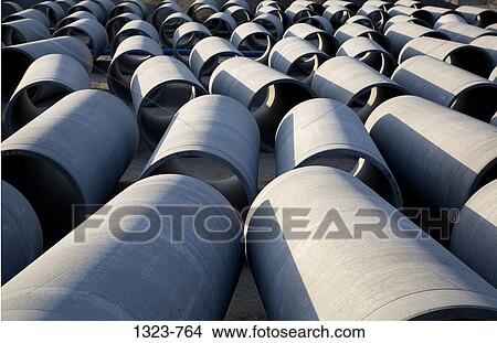 Scattered sewage pipes at a construction site View Large Photo Image Picture - Scattered sewage pipes at a construction site. Fotosearch