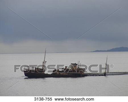 Stock Photography - Shipwreck in the sea, Beagle Channel, Tierra del Fuego, Chile. Fotosearch