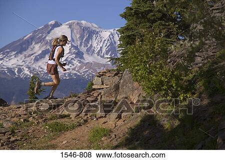 Side profile of a woman running on a mountain, Mt Adams, Washington State, USA View Large Photo Image Stock Photo - Side profile of a woman running on a mountain, Mt Adams, Washington State, USA. Fotosearch