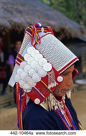 Side profile of an Akha tribal woman wearing a silver headpiece, Chiang Rai, Chiang Rai Province, Thailand View Large Photo Image Stock Image - Side profile of an Akha tribal woman wearing a silver headpiece, Chiang Rai, Chiang Rai Province, Thailand. Fotosearch