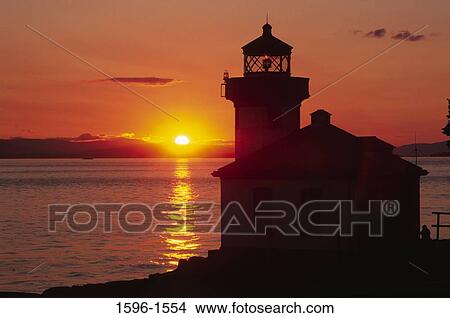 Silhouette of a lighthouse at sunset, Lime Kiln Lighthouse, Lime Kiln Point State Park, San Juan Islands, Washington State, USA View Large Photo Image Picture - Silhouette of a lighthouse at sunset, Lime Kiln Lighthouse, Lime Kiln Point State Park, San Juan Islands, Washington State, USA. Fotosearch