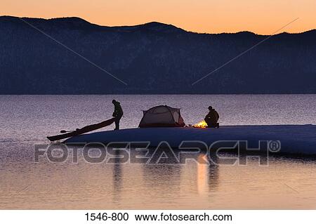 Silhouette of a man and a woman camping at the lakeside, Lake Tahoe, California, USA View Large Photo Image Stock Image - Silhouette of a man and a woman camping at the lakeside, Lake Tahoe, California, USA. Fotosearch