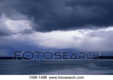 Storm clouds over the sea, Penn Cove, Ebey's Landing National Historic Reserve, Washington State, USA View Large Photo Image Stock Photo - Storm clouds over the sea, Penn Cove, Ebey's Landing National Historic Reserve, Washington State, USA. Fotosearch