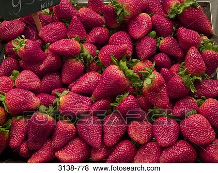 Strawberries at a market stall View Large Photo Image Stock Photo - Strawberries at a market stall. Fotosearch