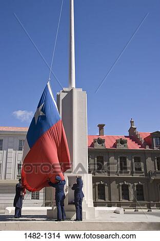 Three army soldiers raising the Chilean Flag, Punta Arenas, Patagonia, Chile View Large Photo Image Picture - Three army soldiers raising the Chilean Flag, Punta Arenas, Patagonia, Chile. Fotosearch