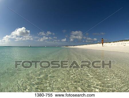 Tourist on the beach, Los Roques, Venezuela View Large Photo Image Stock Photography - Tourist on the beach, Los Roques, Venezuela. Fotosearch