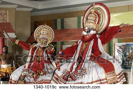 Two Kathakali dancers performing on a stage, Kerala, India View Large Photo Image Stock Image - Two Kathakali dancers performing on a stage, Kerala, India. Fotosearch