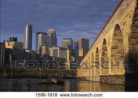 Arch bridge across a river, Stone Arch Bridge, Minneapolis, Hennepin County, Minnesota, USA View Large Photo Image Stock Photo - Arch bridge across a river, Stone Arch Bridge, Minneapolis, Hennepin County, Minnesota, USA. Fotosearch