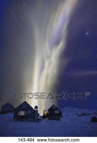 Picture - Aurora borealis in the sky at night, Ammassalik, Greenland. Fotosearch