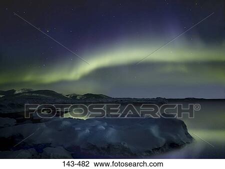 Aurora borealis in the sky at night, Sermilik Fjord, Greenland View Large Photo Image Stock Image - Aurora borealis in the sky at night, Sermilik Fjord, Greenland. Fotosearch