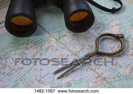 binoculars, map, day, outdoors, world travel, planning, discovery View Large Photo Image Stock Photo - binoculars, map, day, outdoors, world travel, planning, discovery. Fotosearch