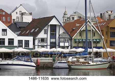 Stock Photography - Boats moored at a harbor, Stavanger, Rogaland County, Norway. Fotosearch