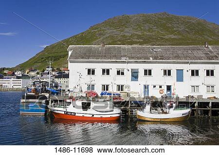 Boats moored at a port, Honningsvag Port, Honningsvag, Mageroya Island, Nordkapp, Finnmark County, Norway View Large Photo Image Stock Photo - Boats moored at a port, Honningsvag Port, Honningsvag, Mageroya Island, Nordkapp, Finnmark County, Norway. Fotosearch