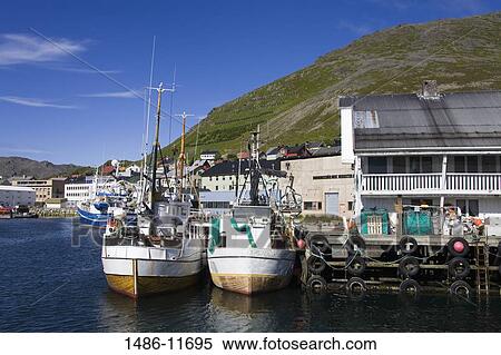 Boats moored at a port, Honningsvag Port, Honningsvag, Mageroya Island, Nordkapp, Finnmark County, Norway View Large Photo Image Stock Photography - Boats moored at a port, Honningsvag Port, Honningsvag, Mageroya Island, Nordkapp, Finnmark County, Norway. Fotosearch