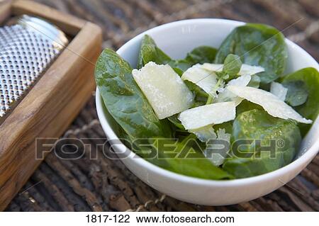 Bowl of vegetable salad with a cheese grater View Large Photo Image Stock Image - Bowl of vegetable salad with a cheese grater. Fotosearch