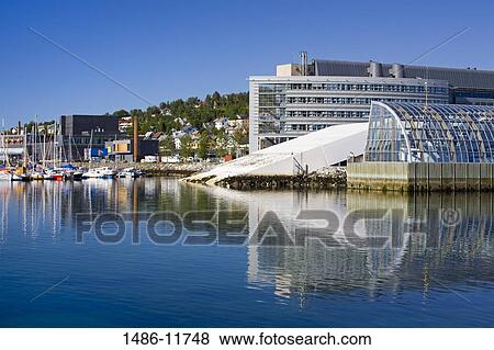 Buildings at the waterfront, Polaria Museum, Tromso, Toms County, Nord-Norge, Norway View Large Photo Image Stock Photo - Buildings at the waterfront, Polaria Museum, Tromso, Toms County, Nord-Norge, Norway. Fotosearch