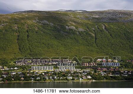 Buildings at the waterfront, Tomasjord, Tromso, Toms County, Nord-Norge, Norway View Large Photo Image Stock Image - Buildings at the waterfront, Tomasjord, Tromso, Toms County, Nord-Norge, Norway. Fotosearch