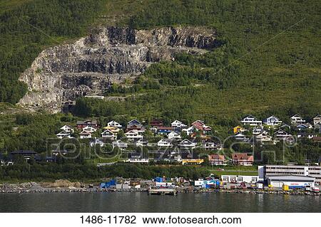 Buildings at the waterfront, Tomasjord, Tromso, Toms County, Nord-Norge, Norway View Large Photo Image Stock Image - Buildings at the waterfront, Tomasjord, Tromso, Toms County, Nord-Norge, Norway. Fotosearch