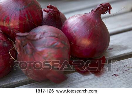 Close-up of red onions View Large Photo Image Stock Photograph - Close-up of red onions. Fotosearch