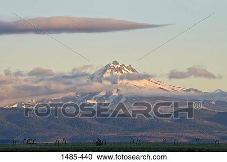 Clouds over a mountain, Mt Jefferson, Cascade Range, Oregon, USA View Large Photo Image Stock Image - Clouds over a mountain, Mt Jefferson, Cascade Range, Oregon, USA. Fotosearch