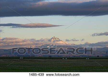 Clouds over a mountain, Mt Jefferson, Cascade Range, Oregon, USA View Large Photo Image Stock Photo - Clouds over a mountain, Mt Jefferson, Cascade Range, Oregon, USA. Fotosearch