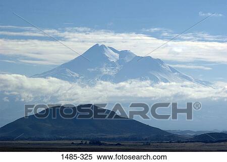 Clouds over a mountain, Mt Shasta, California, USA View Large Photo Image Stock Photography - Clouds over a mountain, Mt Shasta, California, USA. Fotosearch