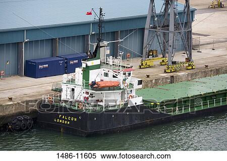 Container ship at a commercial dock, Southampton, Hampshire, England View Large Photo Image Stock Photography - Container ship at a commercial dock, Southampton, Hampshire, England. Fotosearch