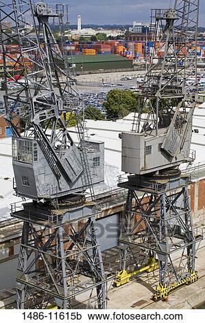 Stock Image - Cranes at a commercial dock, Southampton, Hampshire, England. Fotosearch