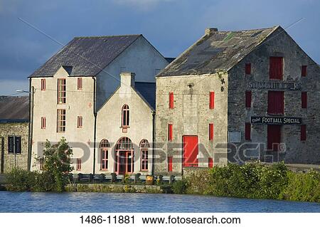 Facade of old warehouses, Ramelton, County Donegal, Ulster Province, Ireland View Large Photo Image Stock Image - Facade of old warehouses, Ramelton, County Donegal, Ulster Province, Ireland. Fotosearch