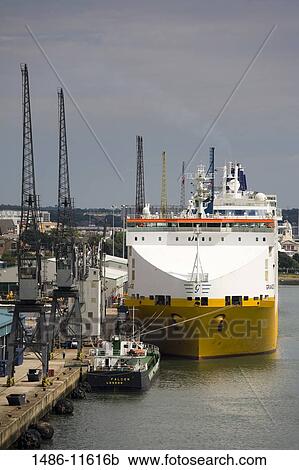 Stock Image - Ferry at a harbor, Southampton, Hampshire, England. Fotosearch