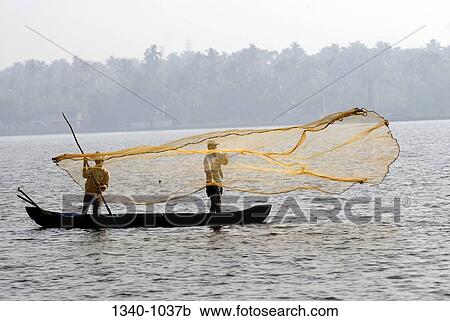 Fisherman throwing a fishing net in a lagoon, Kerala Backwaters, Cherai, Ernakulam District, Kerala, India View Large Photo Image Stock Image - Fisherman throwing a fishing net in a lagoon, Kerala Backwaters, Cherai, Ernakulam District, Kerala, India. Fotosearch